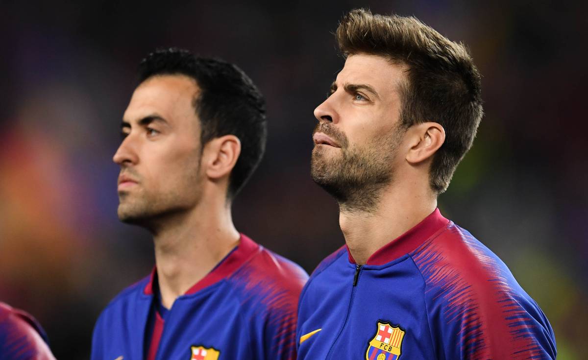 Sergio Busquets and Gerard Hammered, players of the FC Barcelona