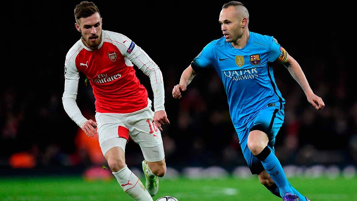Ramsey Beside Andrés Iniesta in the eighth of final of the Champions League