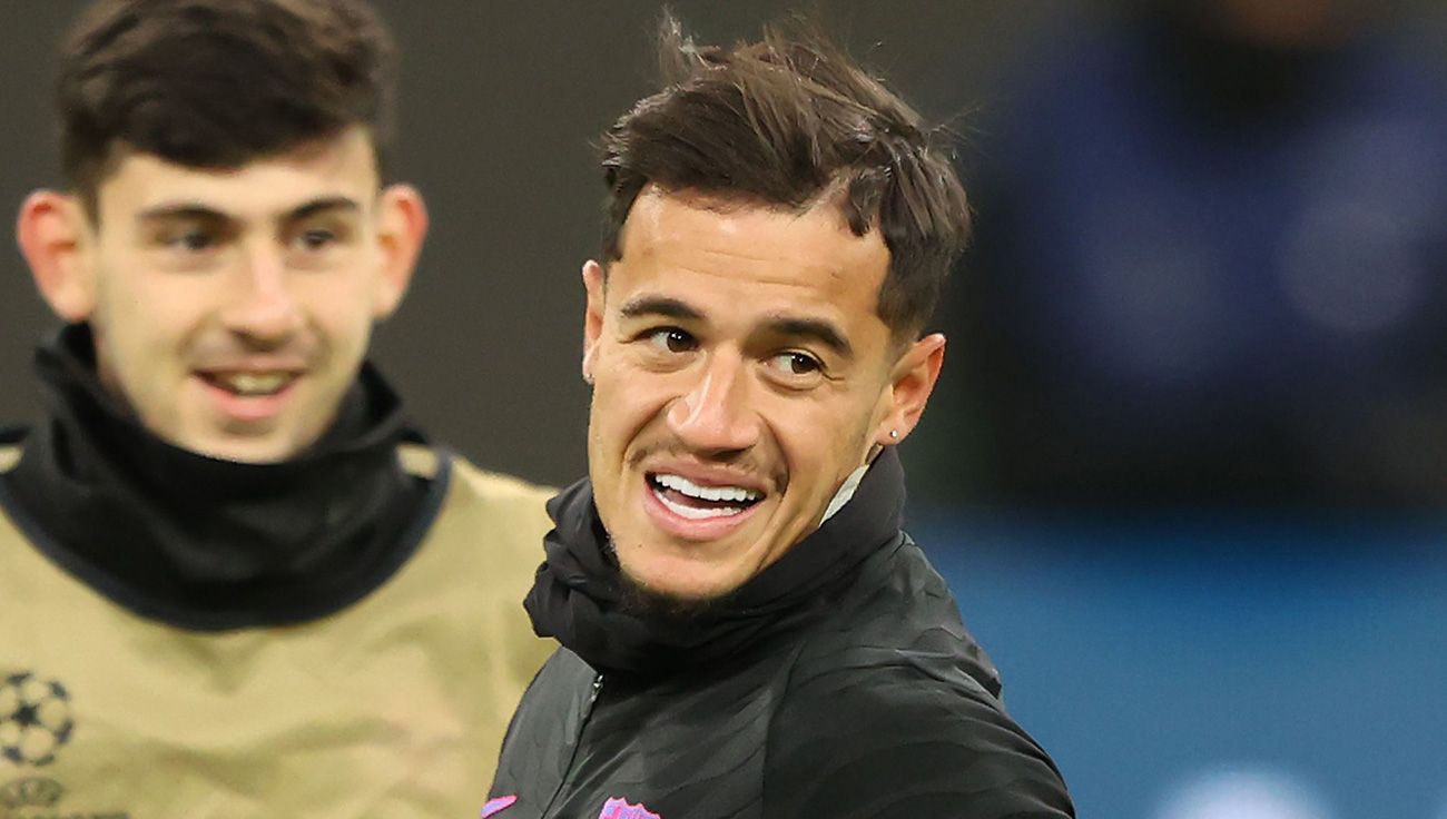 Coutinho smiling in a warm-up