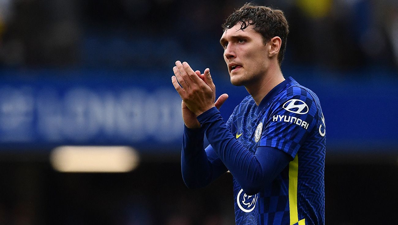 Andreas Christensen applauds at a match