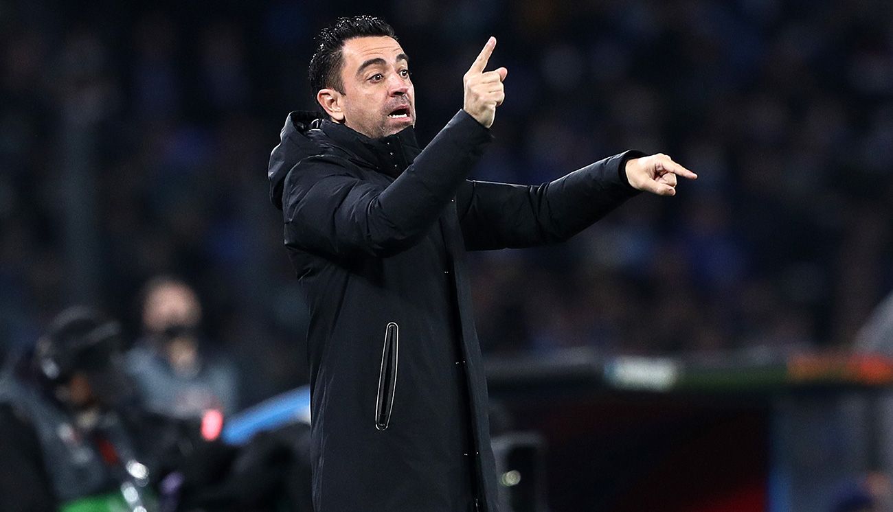 Xavi giving instructions on the bench