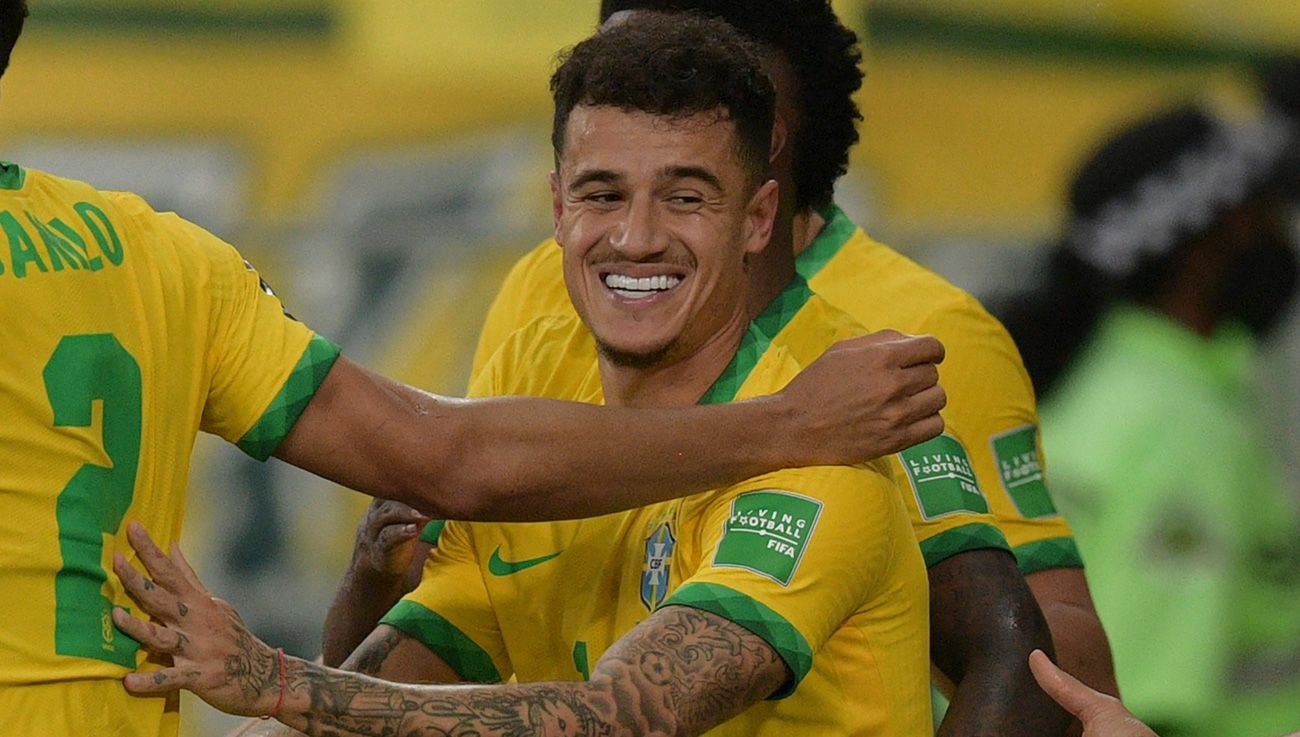 Philippe Coutinho celebrates a goal with Brazil