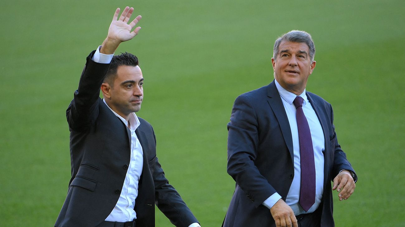 Xavi y Joan Laporta, entrenador y presidente del Barça