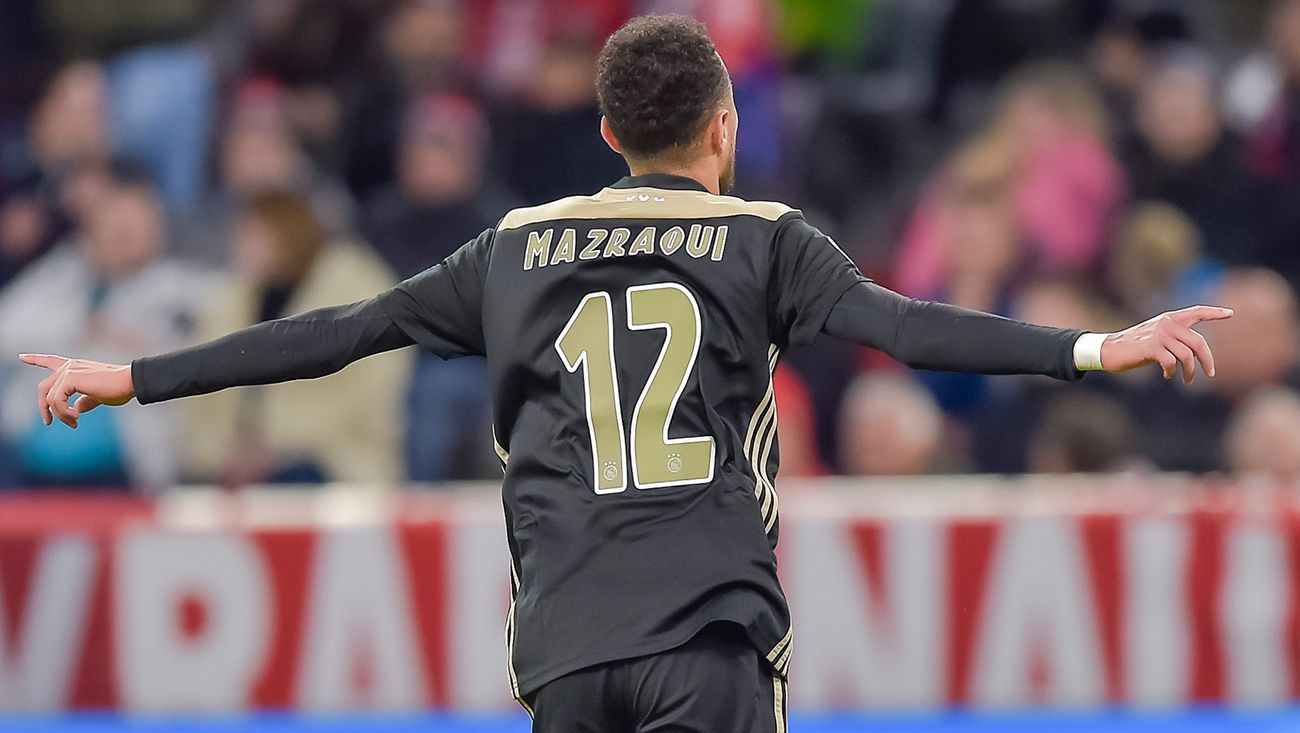 Mazraoui celebrating a goal