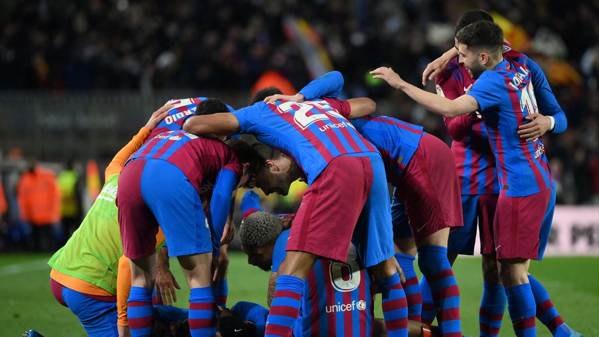 Barcelona's players celebrate Pedri's goal against Sevilla