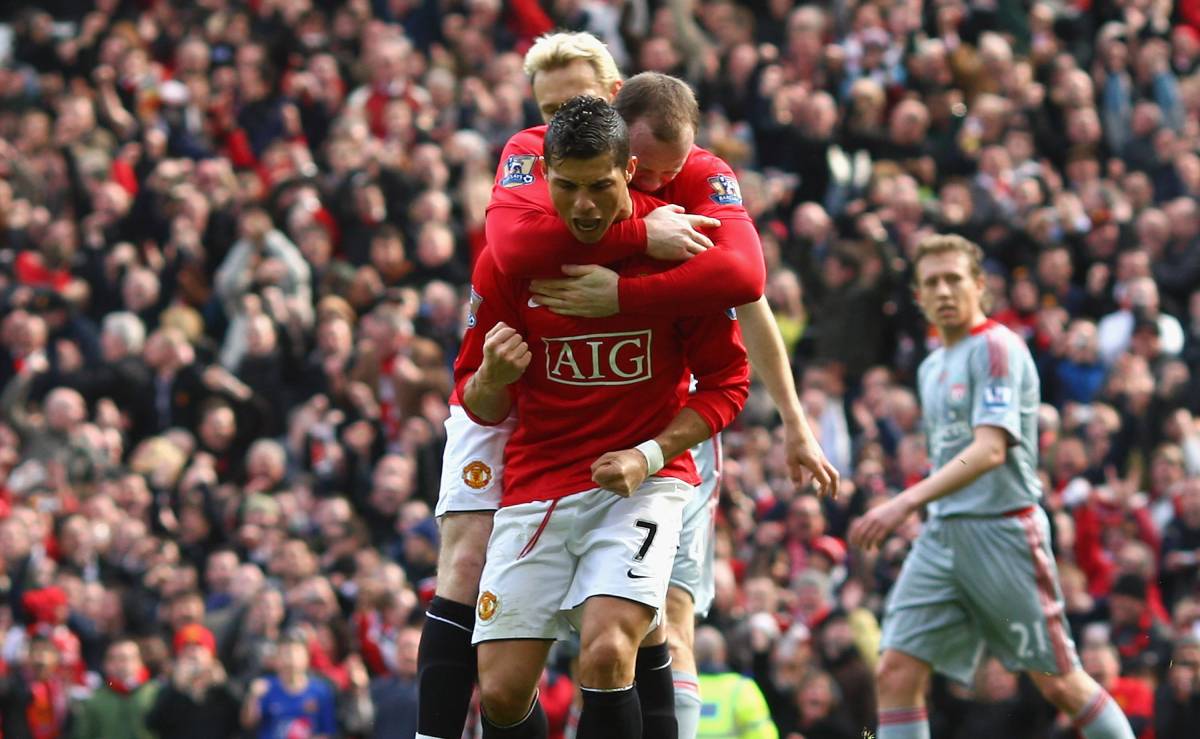 Cristiano Ronaldo and Wayne Rooney during his go through the United