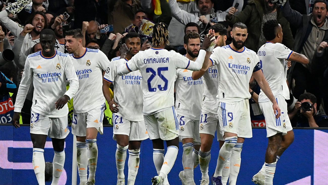 Real Madrid players celebrate the third goal against Manchester City