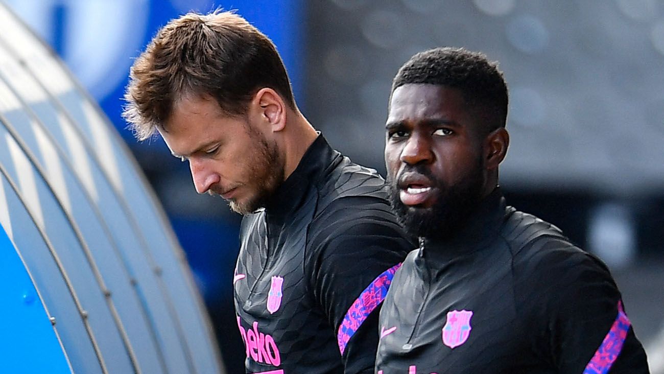 Neto and Umtiti in a training with the Barça