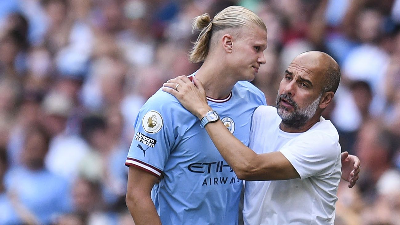 Erling Haaland y Pep Guardiola en un partido con el Manchester City