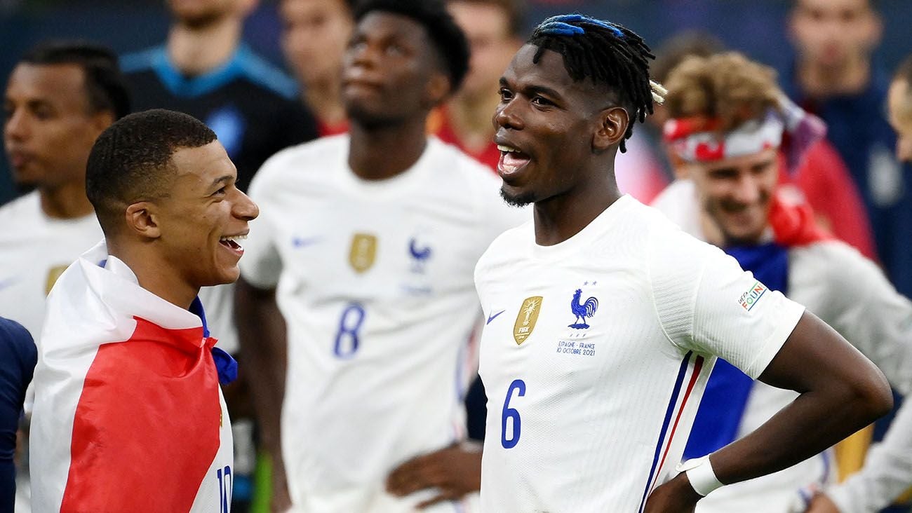 Paul Pogba and Kylian Mbappé after a match with France