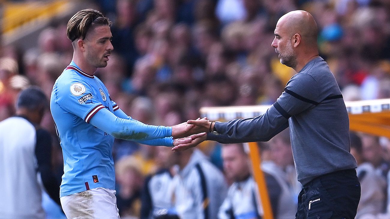 Jack Grealish and Pep Guardiola