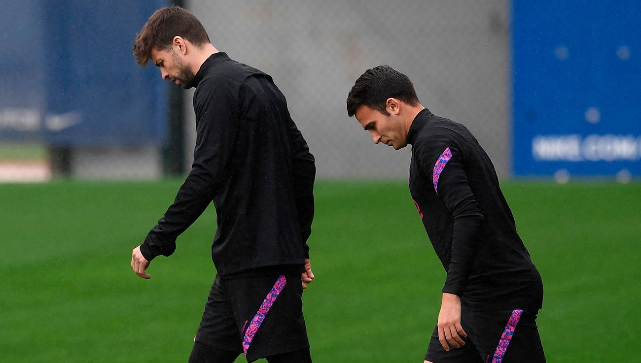 Piqué and Eric in training