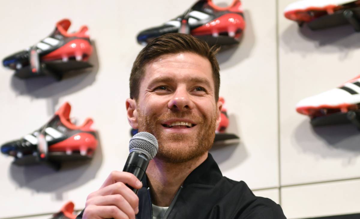 Xabi Alonso speaks during a talk session