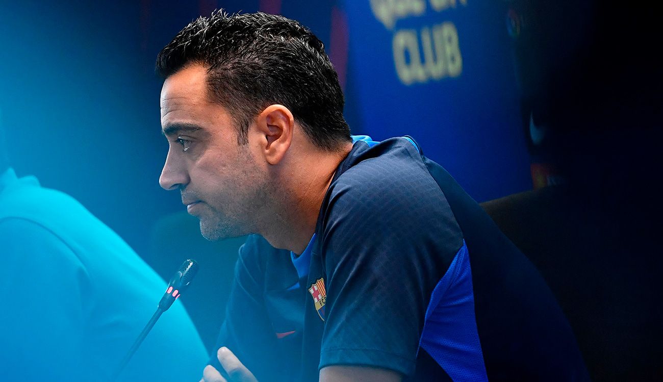 Xavi at a press conference