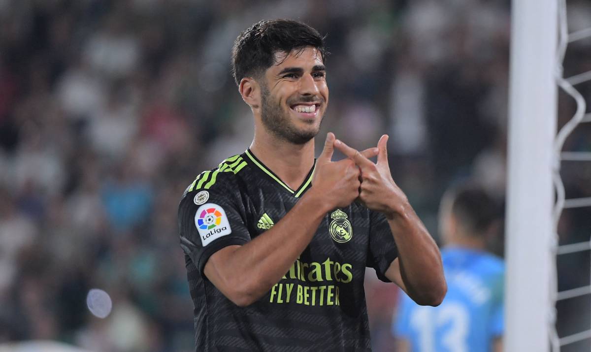 Asensio celebrates after scoring v Elche