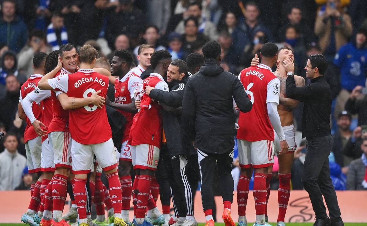 Arsenal players celebrate their victory v Chelsea