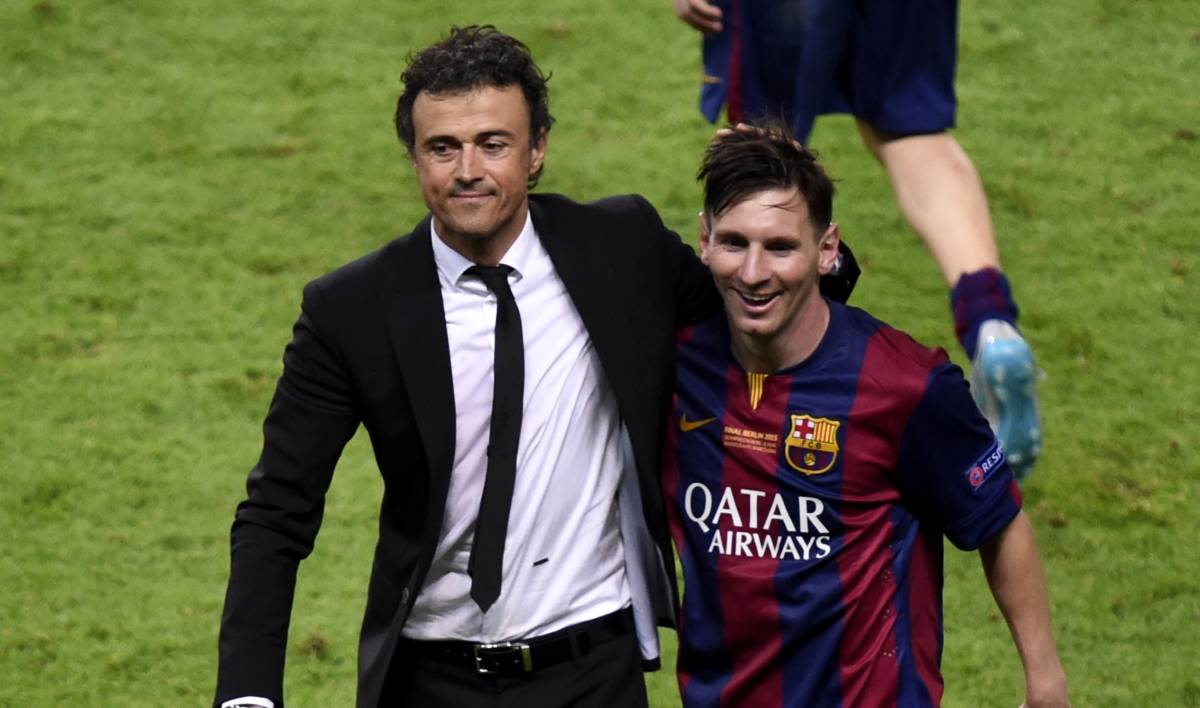 Luis Enrique and Messi celebrate the UCL title