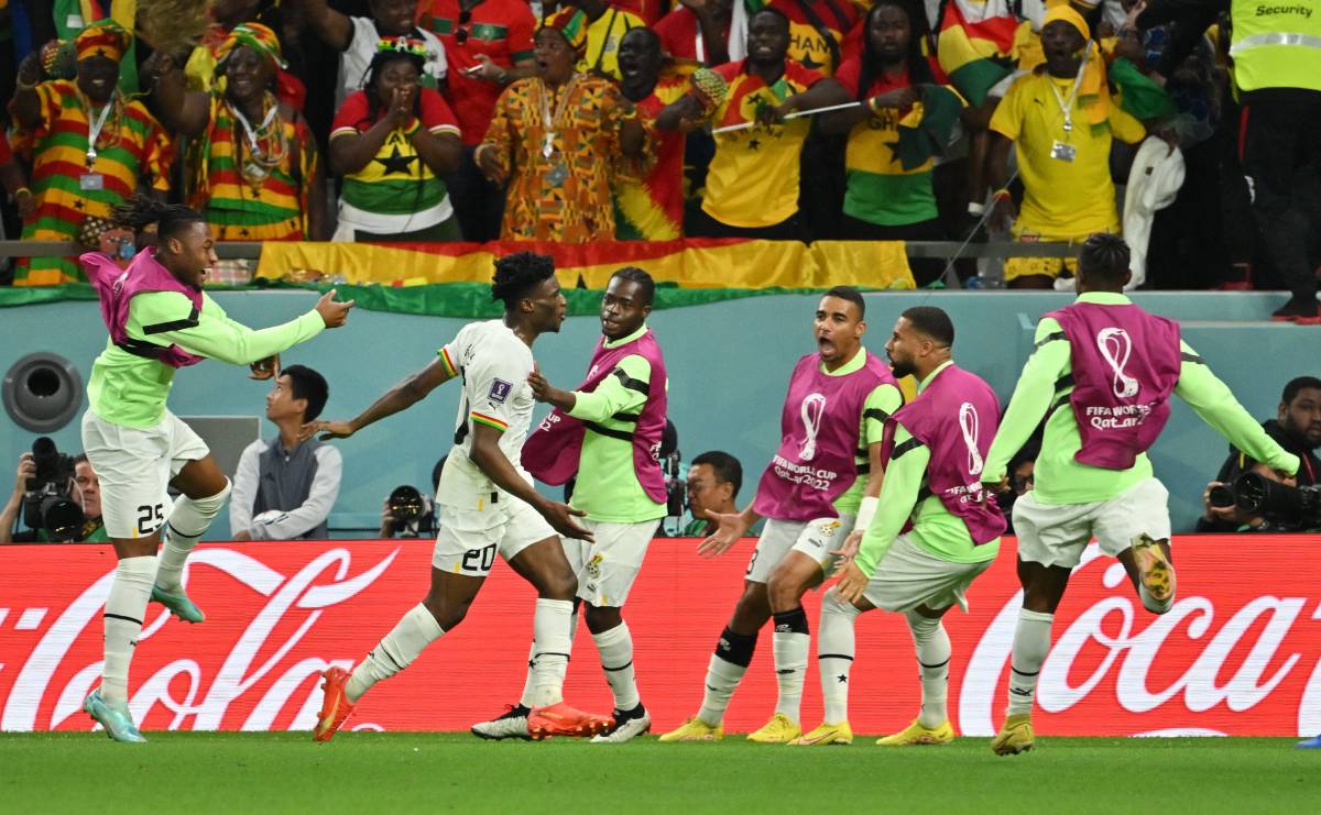 Ghana celebrate after scoring v Korea Republic