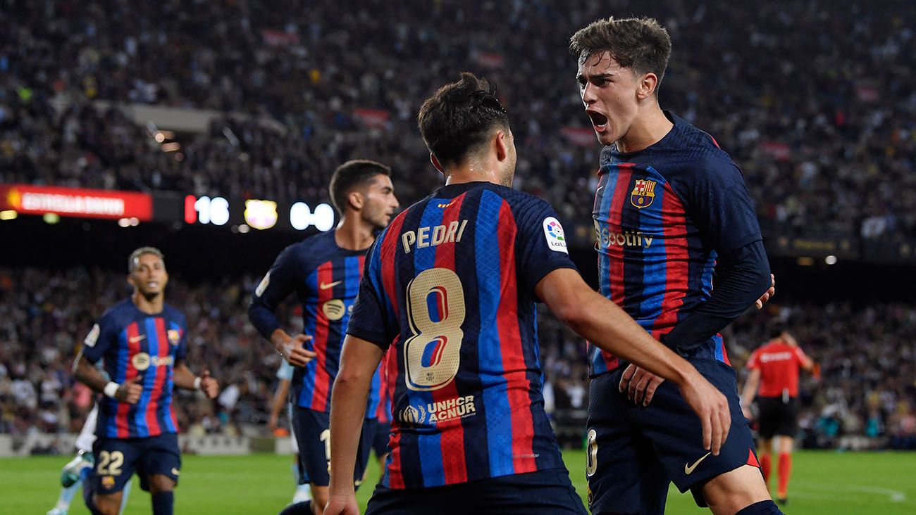 Pedri and Gavi celebrate a goal with Barça