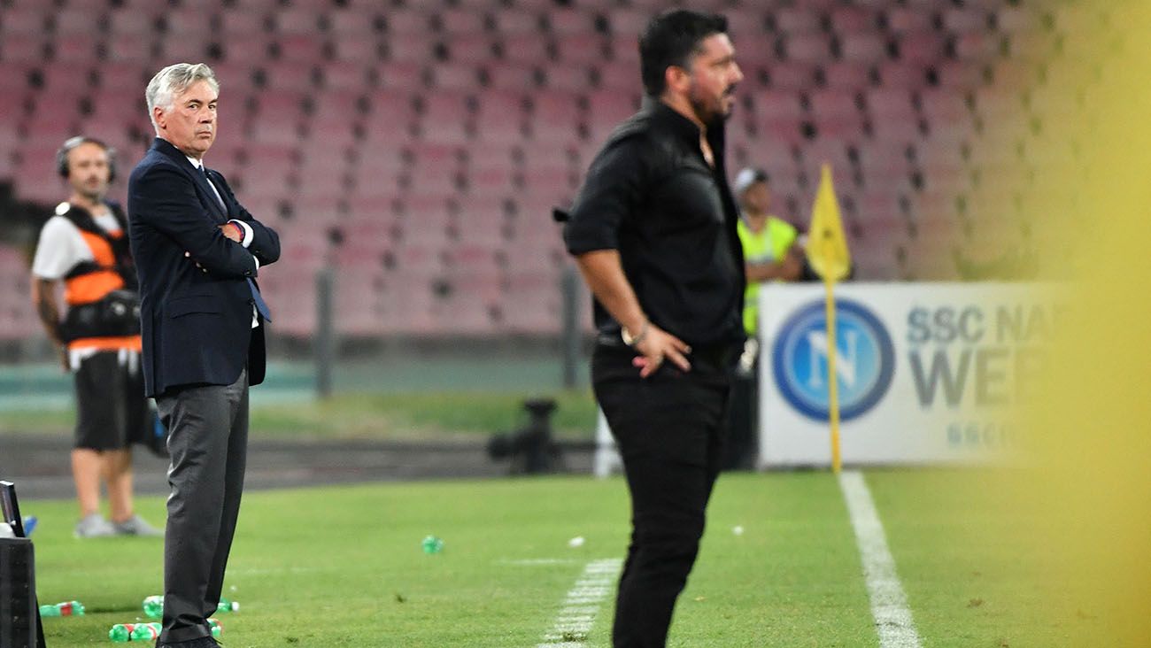 Carlo Ancelotti and Gennaro Gattuso during a Napoli-Milan in 2018