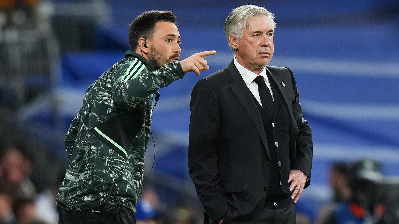 Carlo Ancelotti and his son Davide during a Real Madrid match