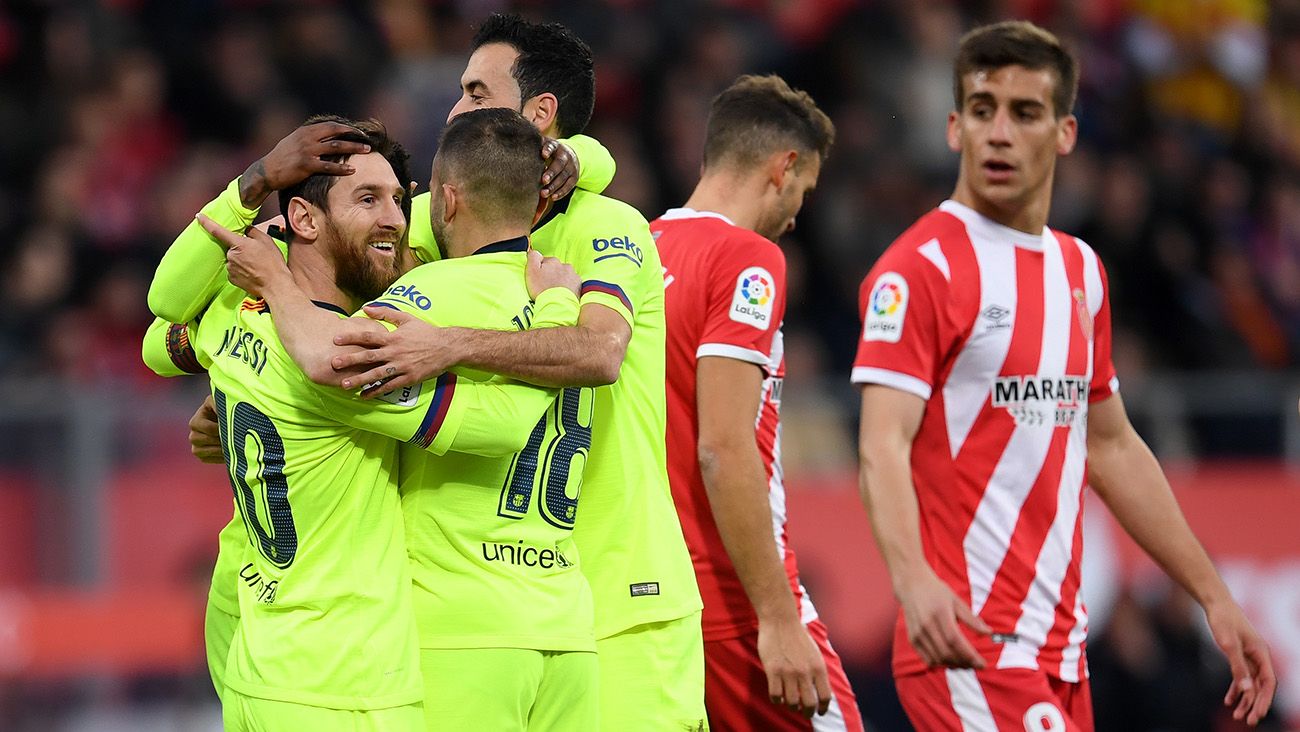 Leo Messi festejando un gol junto a Sergio Busquets y Jordi Alba