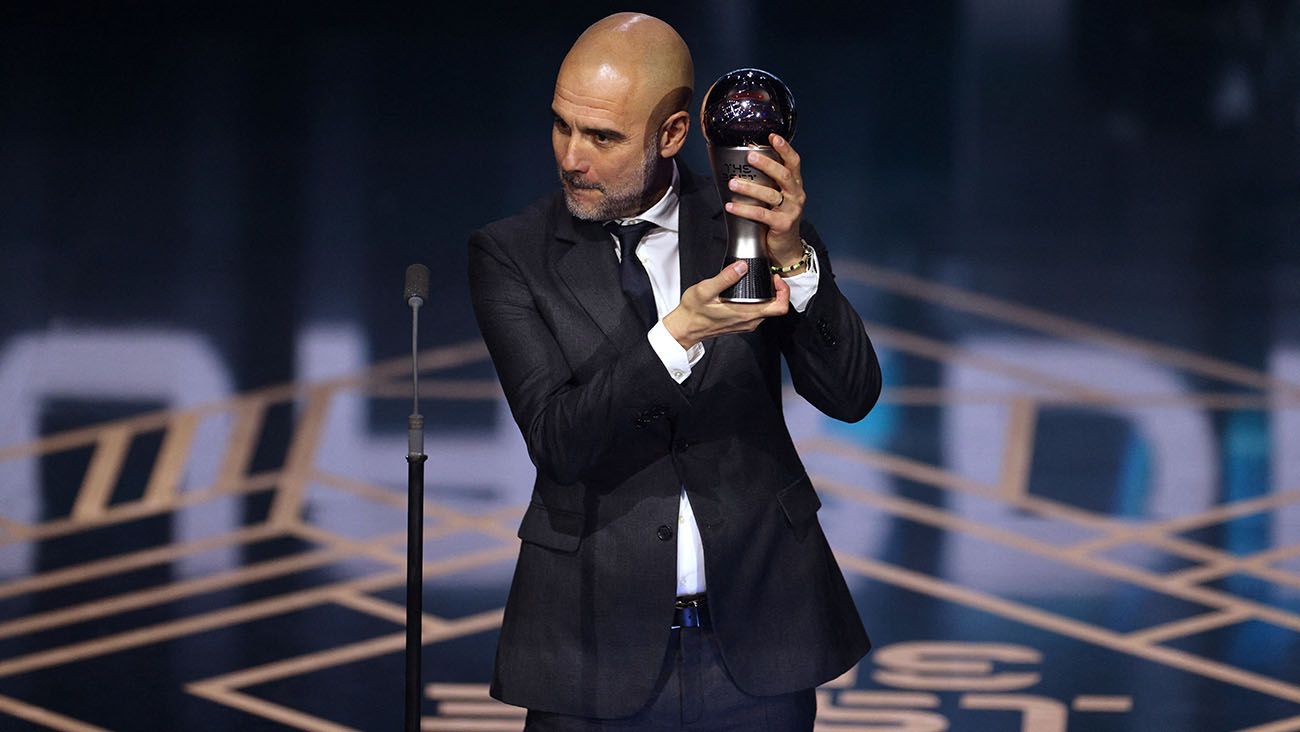 Pep Guardiola with his The Best award for best coach