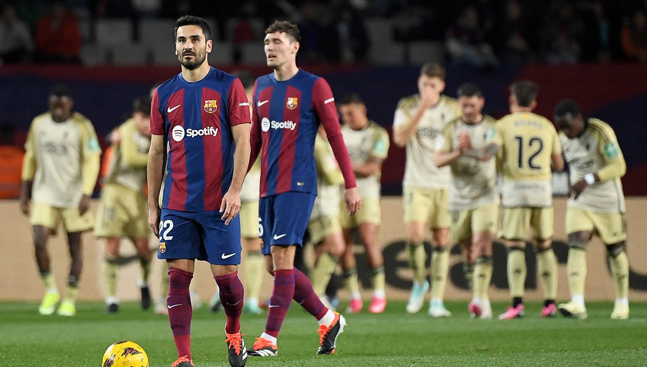 Gündogan y Christensen se lamentan tras un gol del Granada