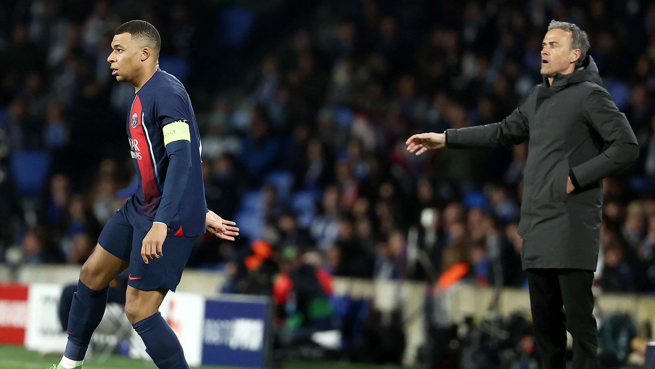 Kylian Mbappé y Luis Enrique durante un partido