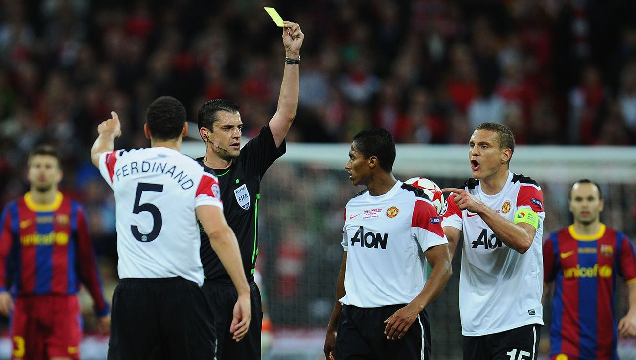 Ferdinand, Valencia y Vidic ante el Barça en 2011