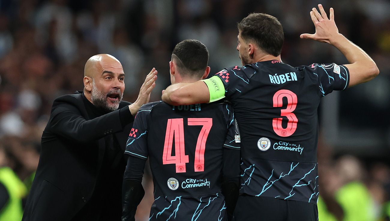 Guardiola, Foden y Rúben Dias celebrando un gol ante el Madrid