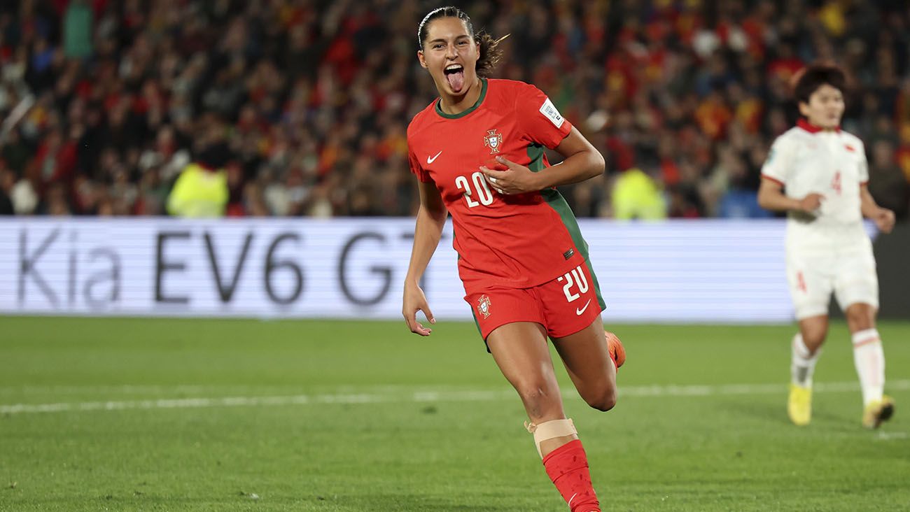 Kika Nazareth celebrating a goal with Portugal