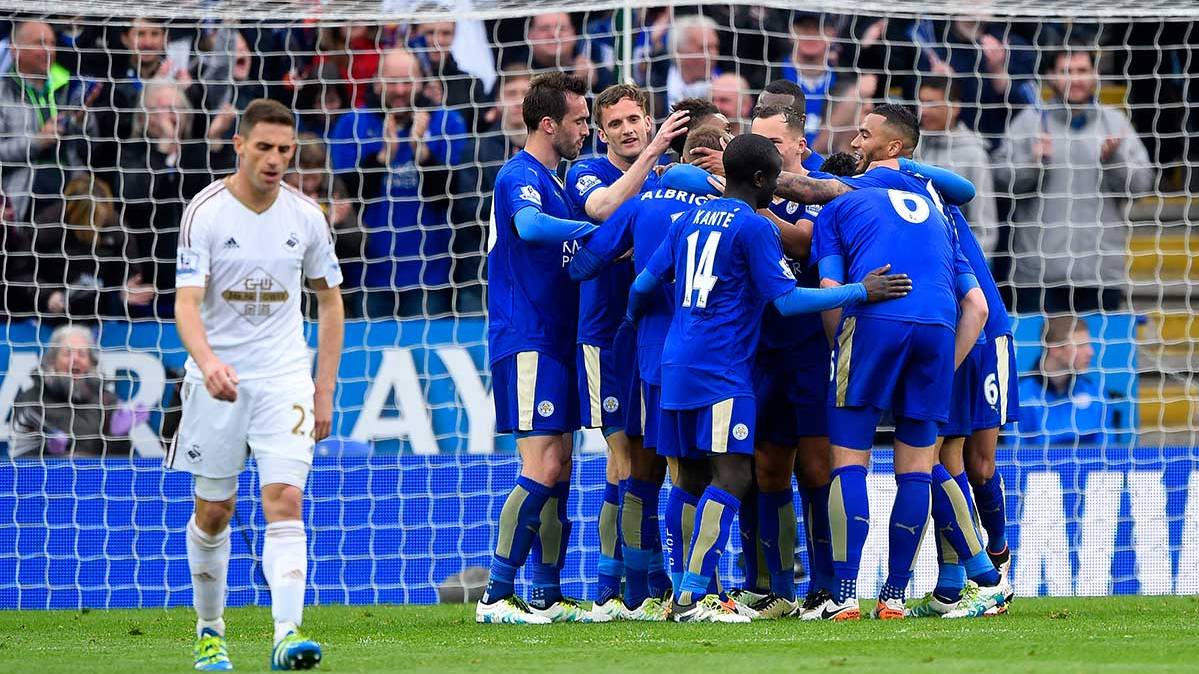 The players of the Leicester City celebrate one of the goals in front of the Swansea