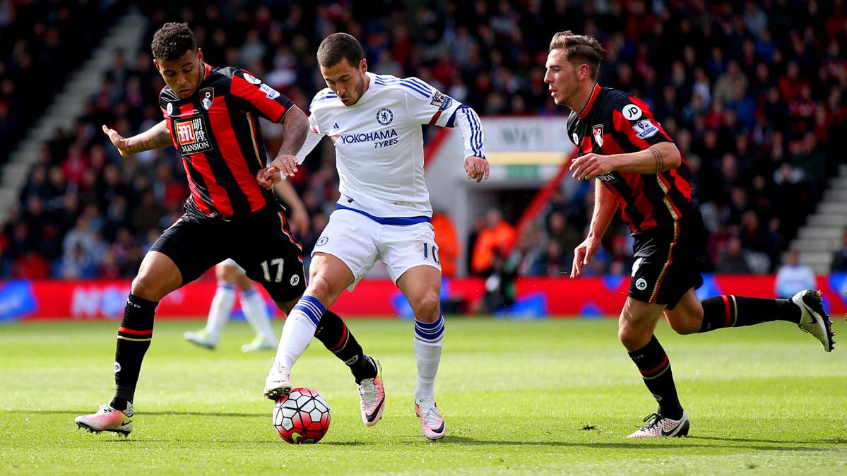 Eden Hazard, struggling by a balloon with Joshua King and Dan Gosling, of the Bournemouth
