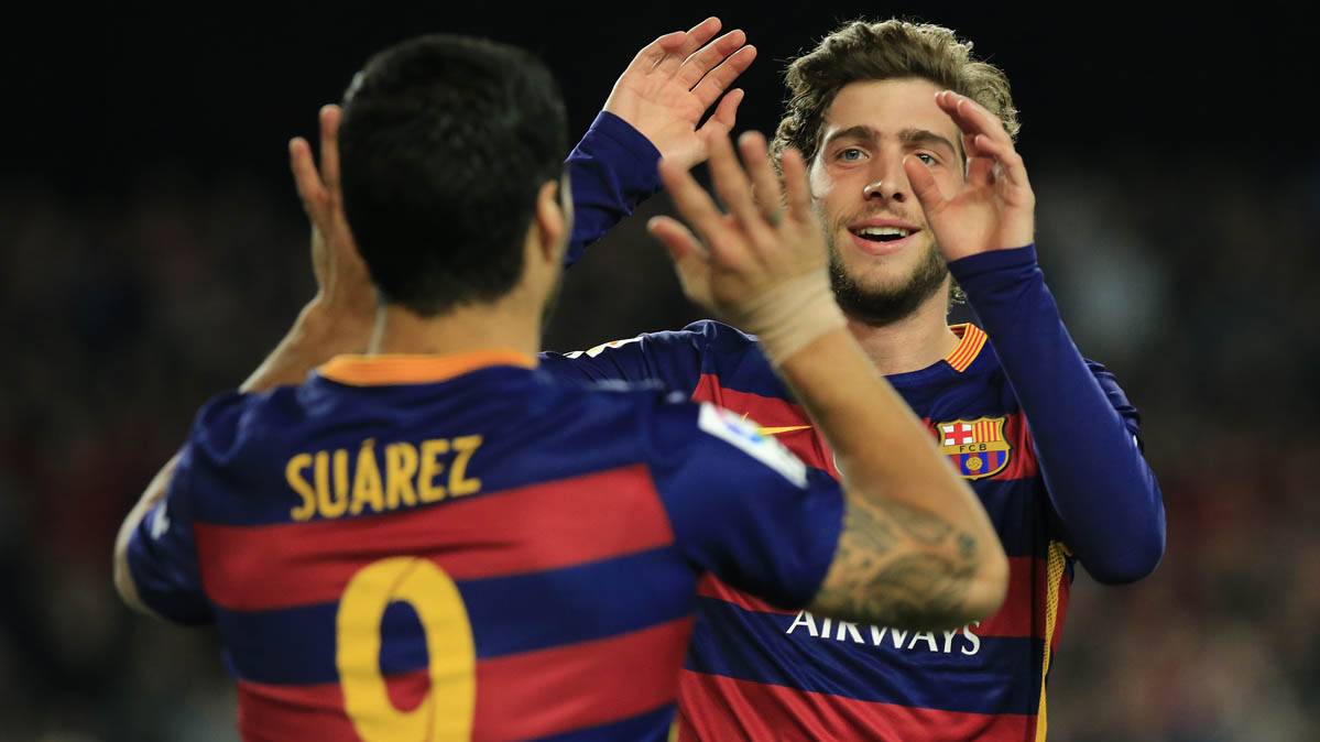 Sergi Roberto, celebrating a goal with Luis Suárez