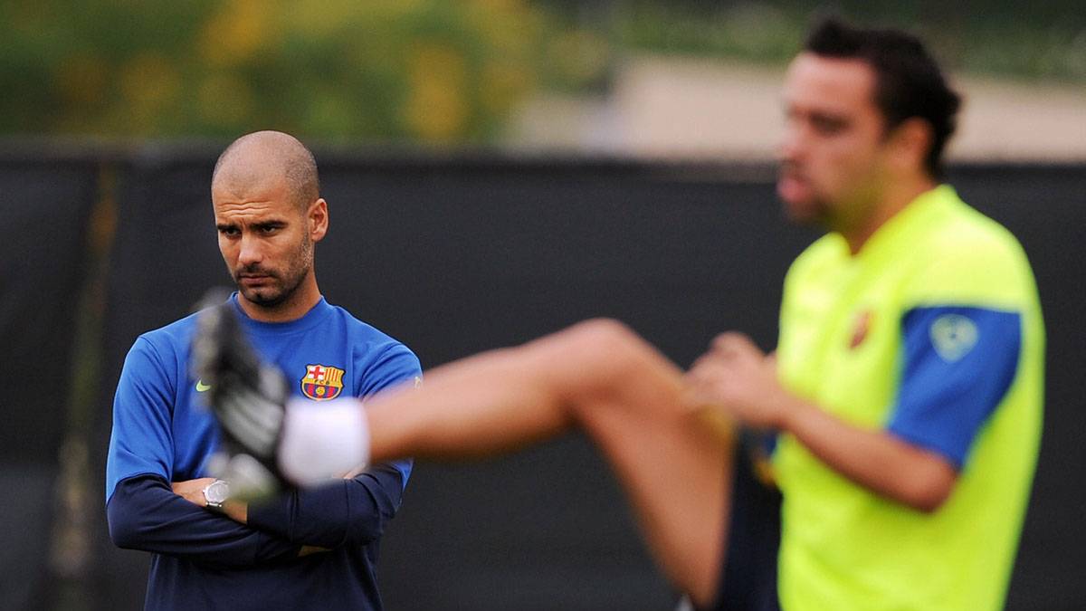Pep Guardiola and Xavi, in a train of the Barça of 2009