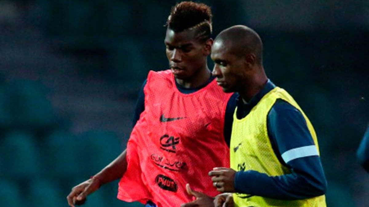 Eric Abidal beside Paul Pogba when they coincided in the selection of France