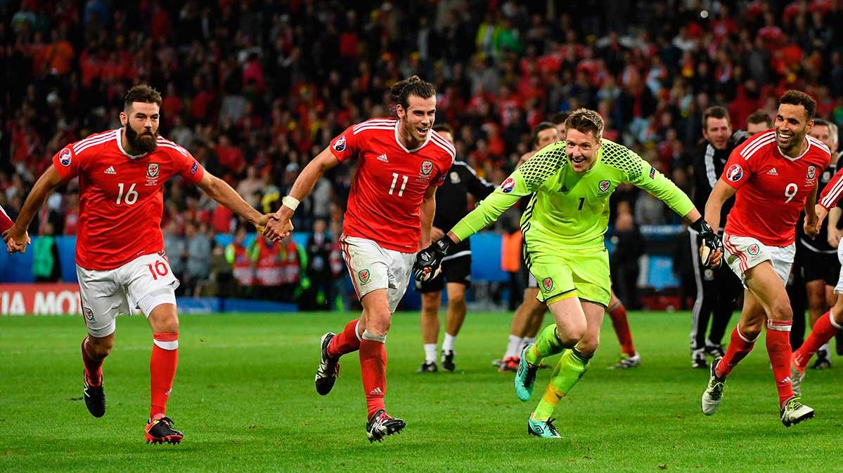 Gareth Bleat and Wales celebrate his pass in front of Belgium