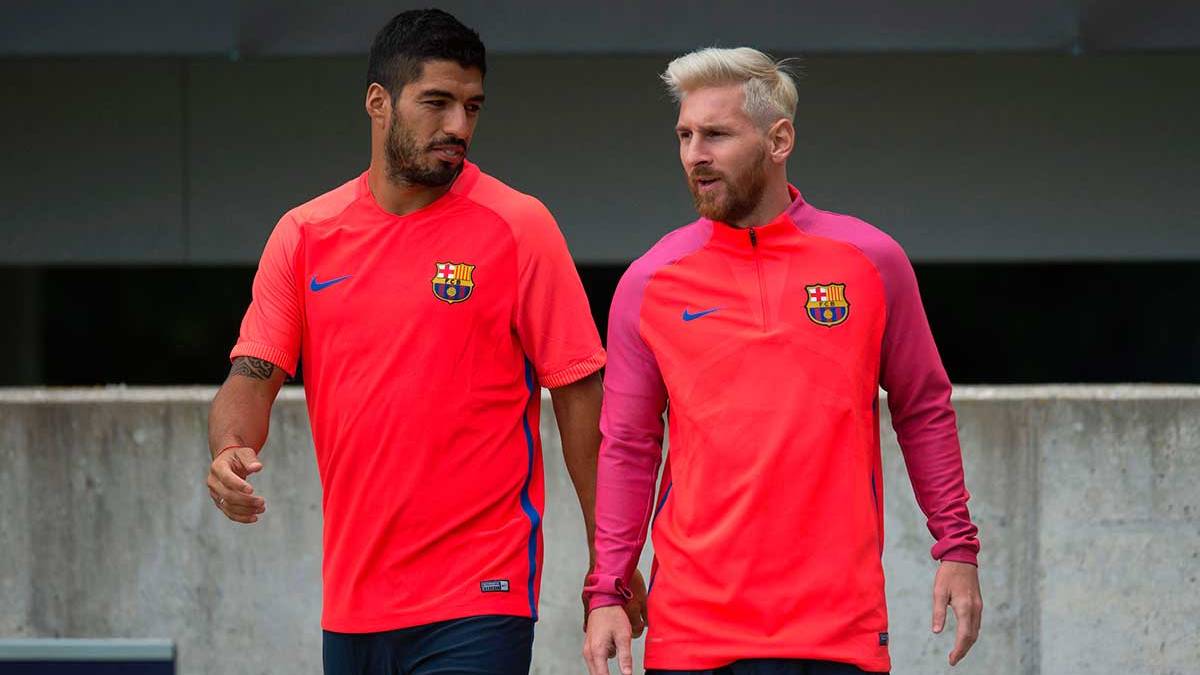 Leo Messi junto con Luis Suárez en un entrenamiento con el FC Barcelona