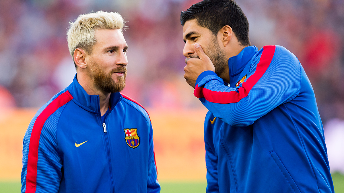 Messi and Luis Suárez, in a photography of archive