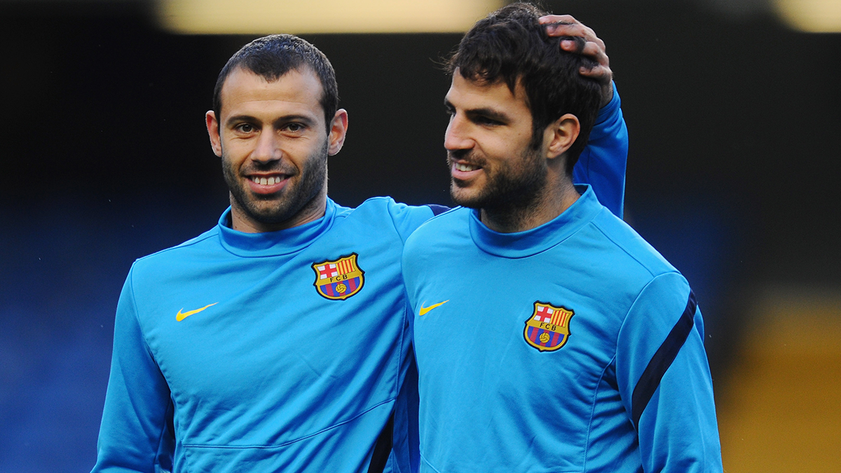 Javier Mascherano beside Cesc Fàbregas in a training does years with the Barça