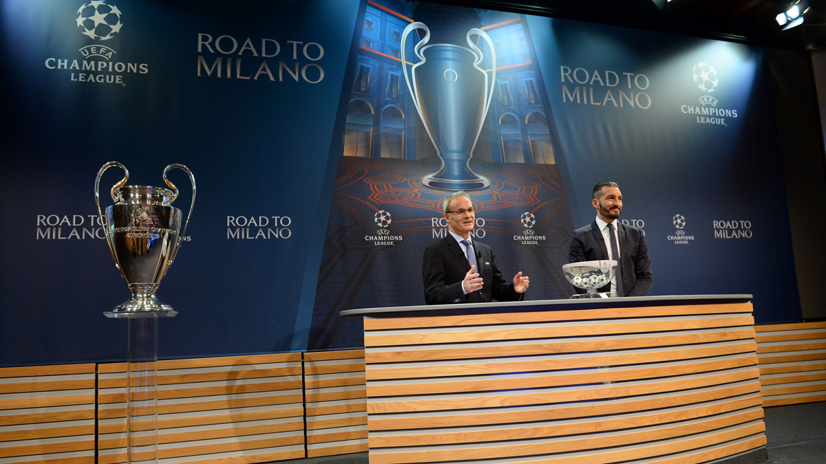 El director de competiciones de la UEFA, Giorgio Marchetti, junto a Zambrotta
