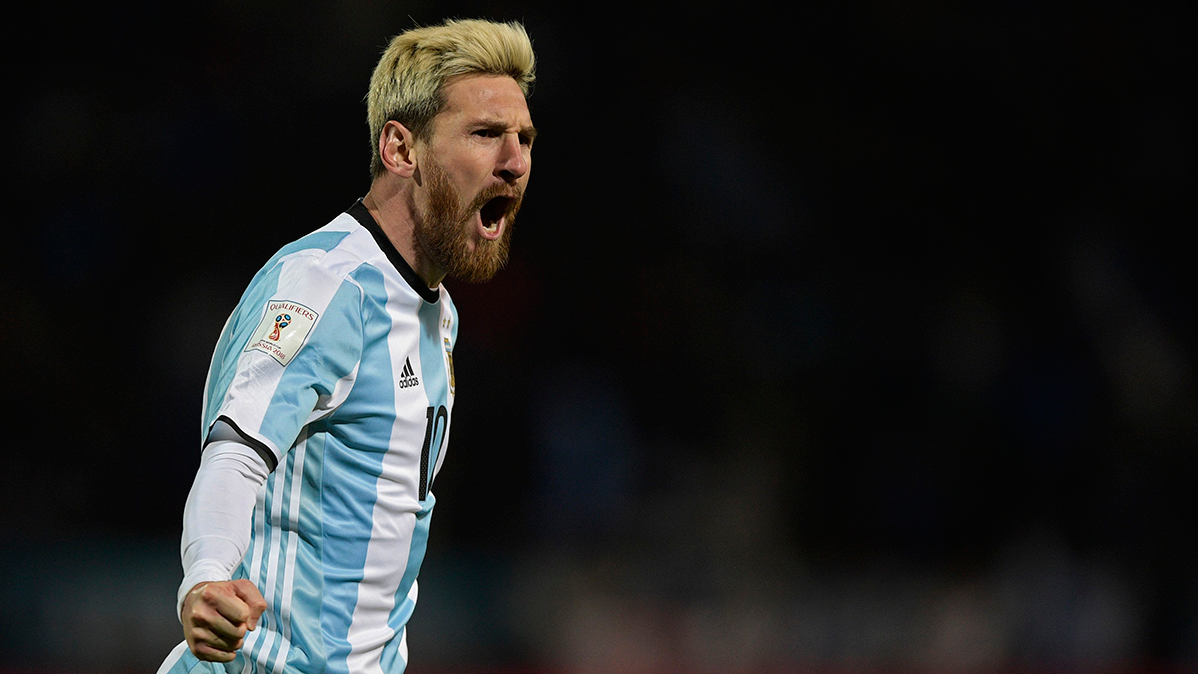 Leo Messi celebrates his goal in front of Uruguay