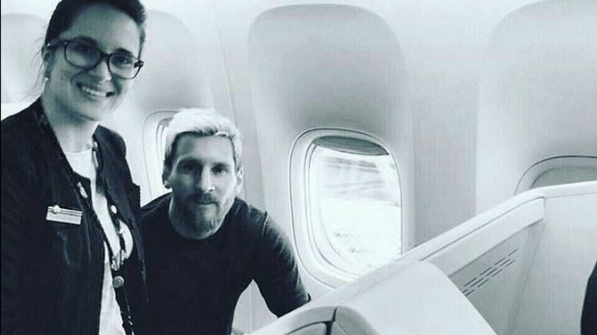 Lionel Messi, in the aeroplane that brought him homeward