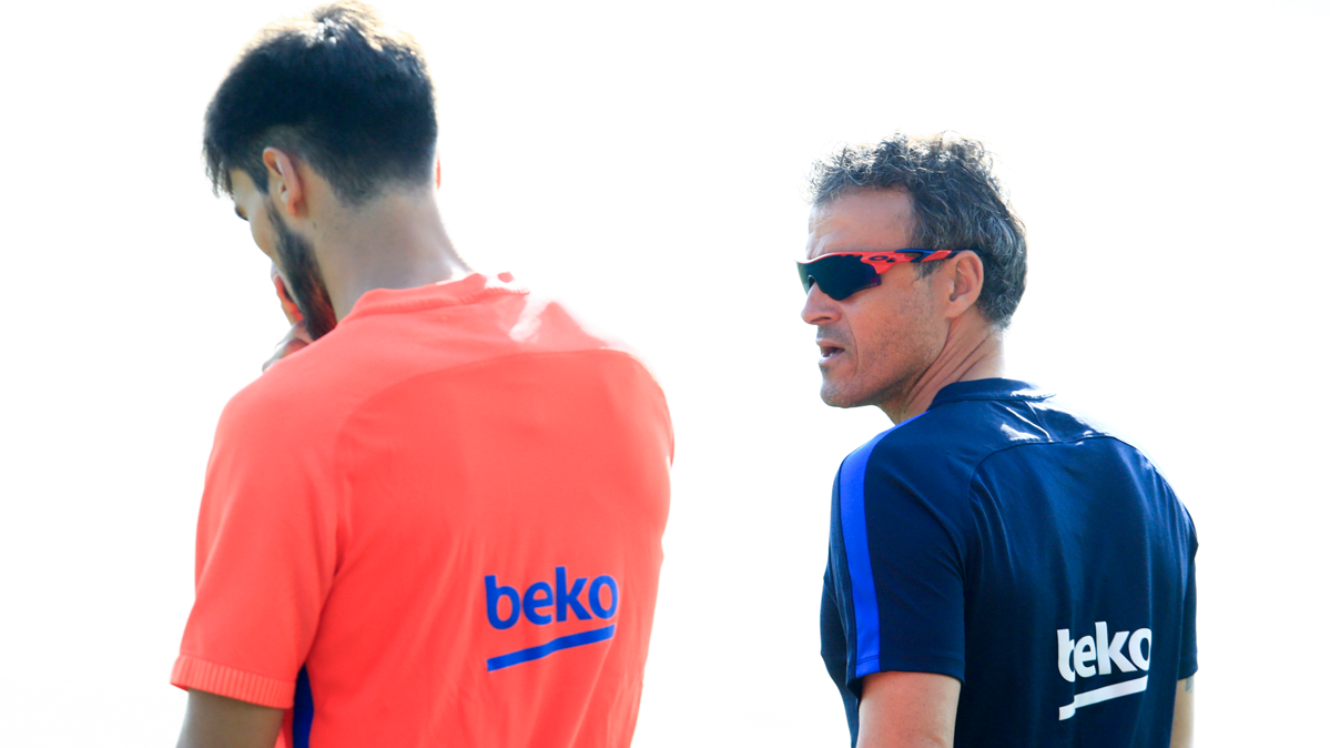André Gomes, chatting with Luis Enrique in a training
