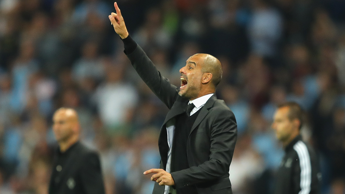 Pep Guardiola giving indications from the terracing in the City-Gladbach