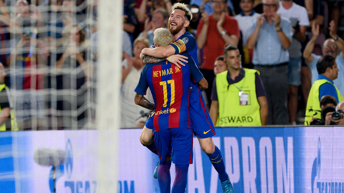 Leo Messi and Neymar Jr, celebrating a goal in the Camp Nou