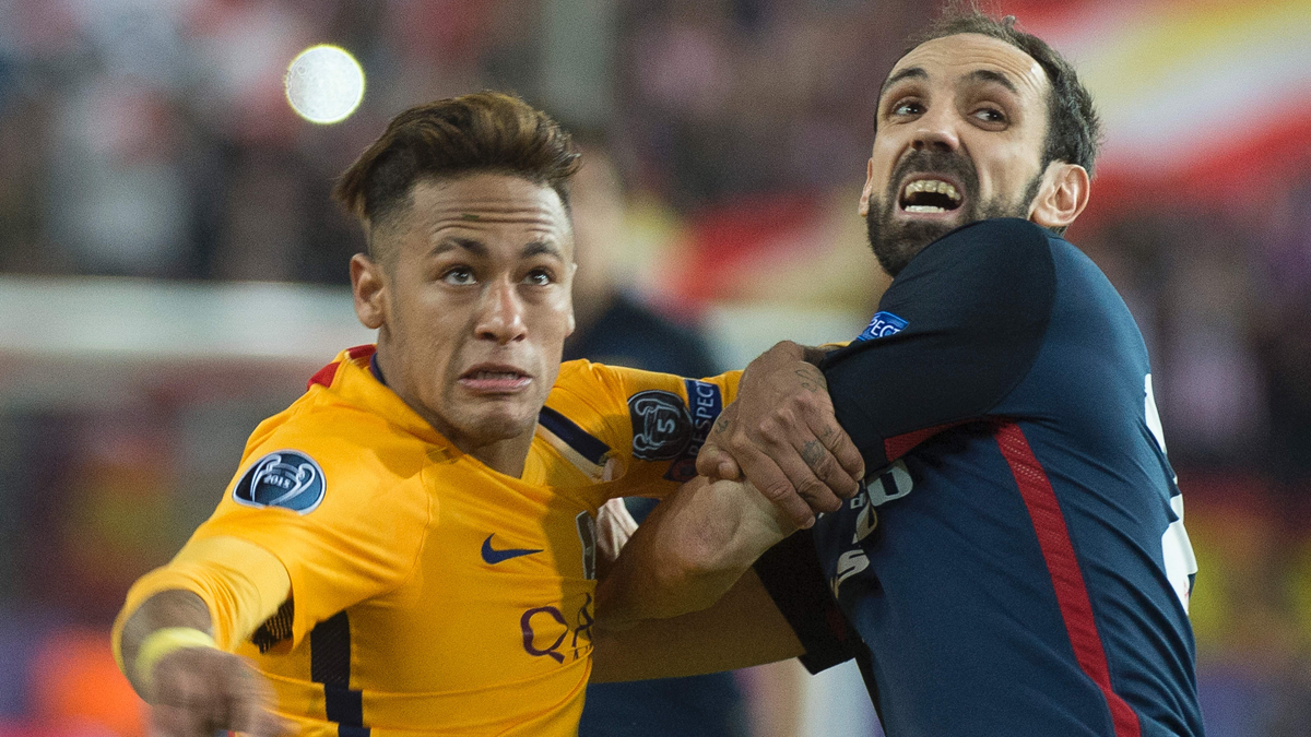 Juanfran And Neymar, struggling by a balloon in a party of the past course
