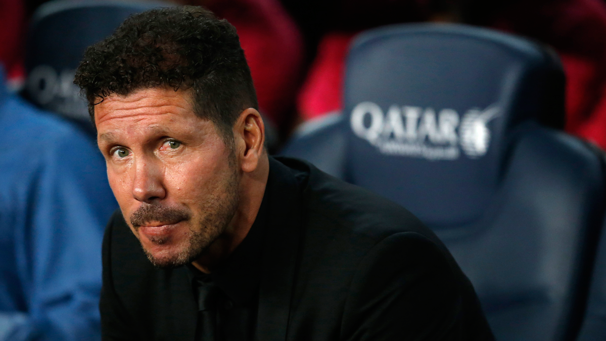 Diego Pablo Simeone, seated in the bench of the Camp Nou