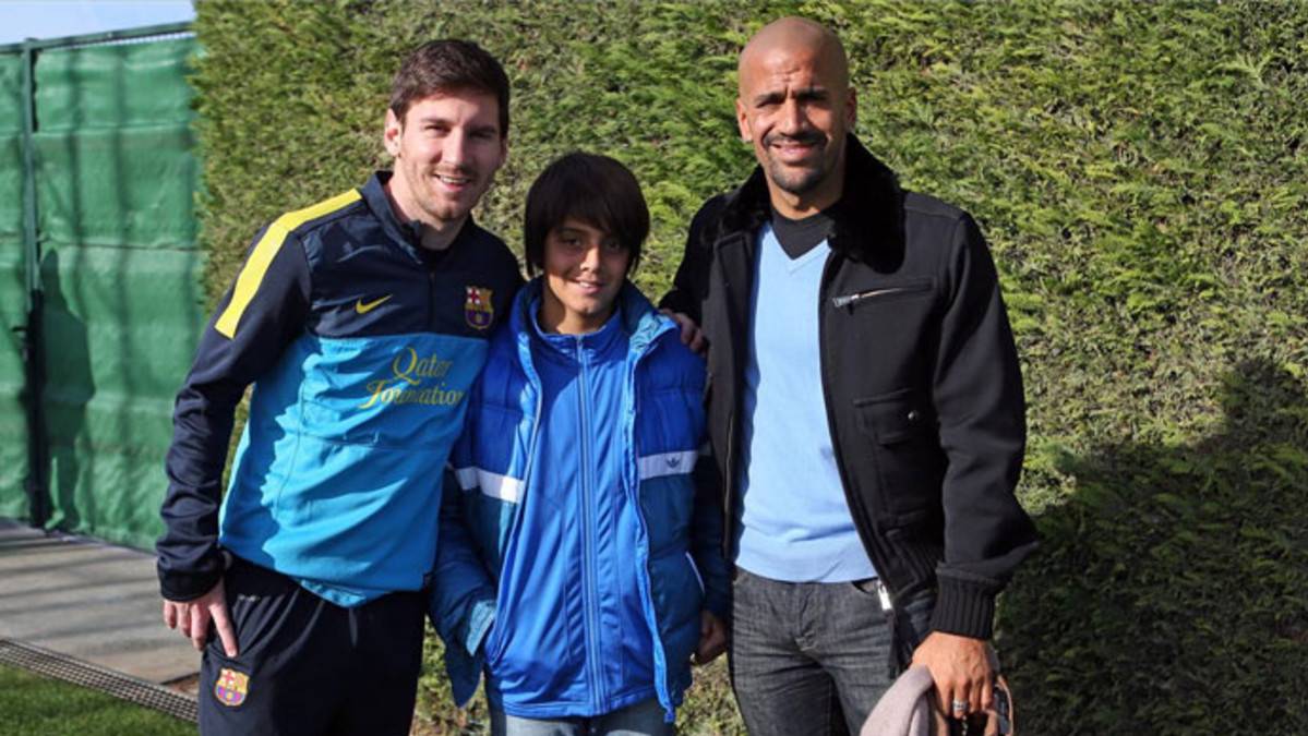 Juan Sebastián Verón and Leo Messi in the FC Barcelona